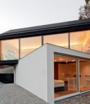 Black on White House – Two Building Volumes Opening Towards the Forest (1)